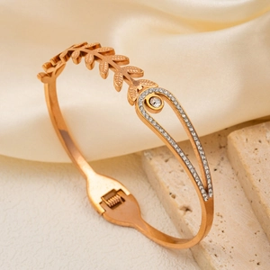 Rose gold asteroid bracelet with crystal vine leaf and letter Q hinge buckle for women
