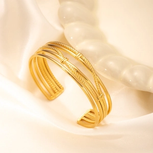 Irregular gold multilayer twisted C-shaped titanium steel bracelet with layered texture