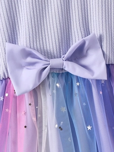 Sleeveless rainbow tulle dress for girls featuring sequin stars and a large purple bow