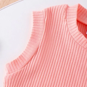 Detail of pink ribbed knit sleeveless top featuring soft texture and round neckline