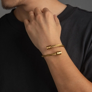 Men's 18k gold plated titanium steel cable twist open cuff bracelet on wrist