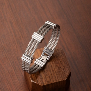 Men's triple-strand cable stainless steel bracelet with grooved metal connectors