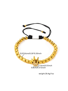 Detail view of gold beaded crown bracelet with 0.6cm beads and adjustable black cord