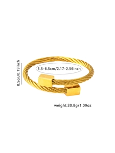 Detail of twisted gold rope bracelet with cube ends showing 0.5cm width and texture
