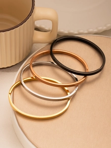 Polished stainless steel hinge bracelets set in gold, silver, rose gold and black finishes