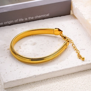 Minimalist 18k gold plated ribbed snake bone bracelet with lobster clasp and adjustable chain