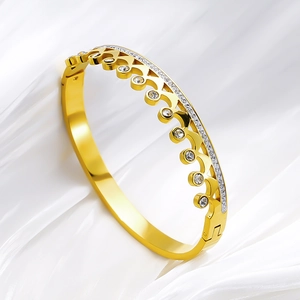 Luxurious gold crown bangle in titanium steel with sparkling zircon stone accents