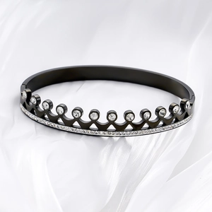 Luxurious black crown titanium steel bangle with white zircon inlays on white silk