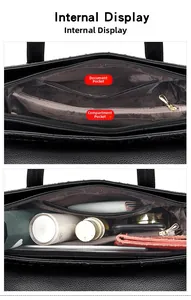 Détails de l'intérieur du sac à main noir motif crocodile avec compartiments spacieux