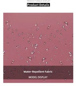 Detailed close-up of water-resistant nylon fabric with beads of water on pink material