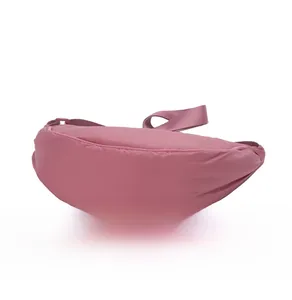 Detail view of pink nylon crescent bag showing high-quality stitching and curved base