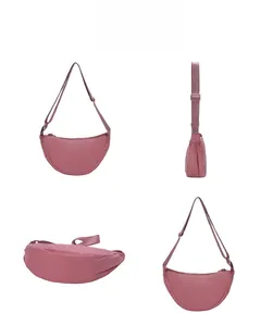 Multiple views of a dusty rose nylon half-moon crossbody bag with adjustable straps
