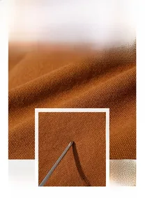 Detail showing abrasion resistant and scratchproof fabric of the canvas tote bag