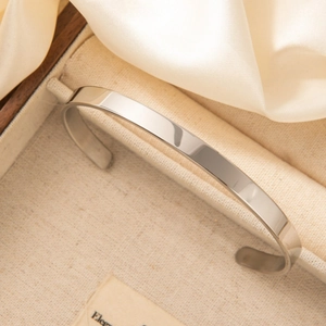 Polished silver minimalist open C-shaped cuff bracelet in elegant jewelry gift box