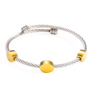 Adjustable twisted cable wire bracelet with 18k gold-plated circular metal charms