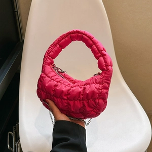 Magenta quilted cloud handbag with silver metal chain and round handle for daily fashion
