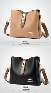 Vue détaillée des sacs seaux en similicuir kaki et noir avec fermeture à boucle métal