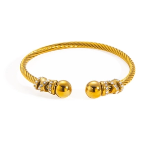 Bracelet jonc torsadé doré avec extrémités en strass et design minimaliste en acier