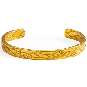 Minimalist 18k gold-plated stainless steel cuff bracelet featuring embossed leaf patterns