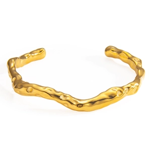 Irregular C-shaped gold-plated stainless steel cuff bracelet with lava texture for women