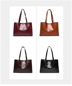 Multiple views of crocodile texture tote bags in red, khaki, brown and black colors