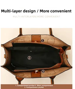 Interior view showing spacious compartments and zipper divider in brown tote bag