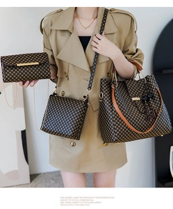 Three-piece handbag set featuring geometric pattern tote with tassel and metal handles