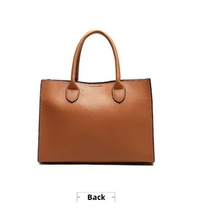 Back view of brown lychee texture tote bag with cylindrical handles and black edge finish