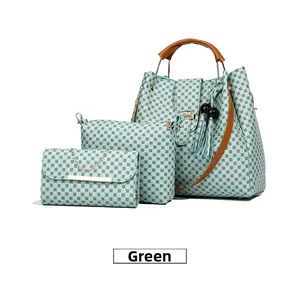 Detailed set of green patterned tote bag, crossbody pouch and small clutch with gold hardware