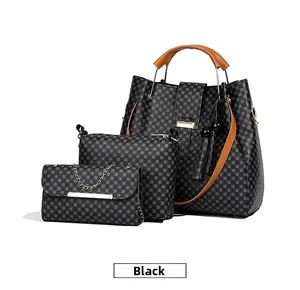 Detailed set of black tote bag, crossbody bag and wallet with dot texture and tassels