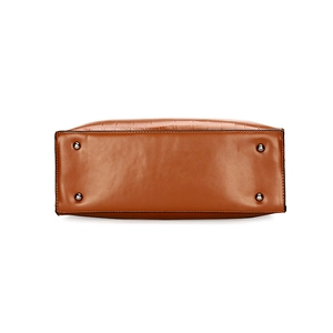 Brown crocodile embossed leather handbag showing bottom view with metal protective studs