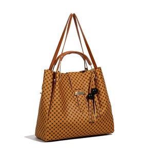 Brown tote bag with geometric texture, leather handles and fringe tassel detail