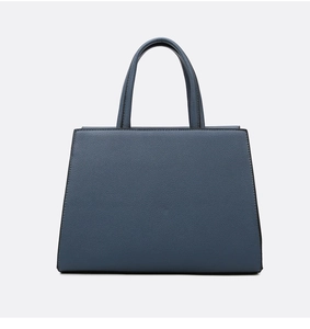 Detailed front view of gray-blue tote bag in litchi grain leather with twin handles