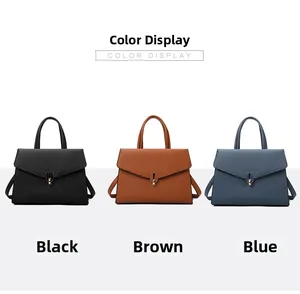 Three leather handbags in black, brown, and blue with metal locks and shoulder straps