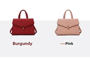 Close-up of Saffiano leather handbags in wine red and pink with metallic hardware