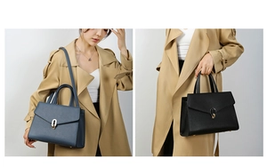 Classic leather handbags in black and blue with oval metal clasps and shoulder straps