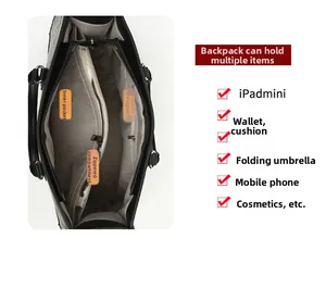Detailansicht der großen Tasche mit Steinmuster und mehreren internen Staufächern