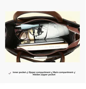 Crocodile pattern tote bag interior with multiple compartments and zipper pockets