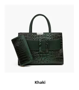 Detail of green crocodile texture handbag and matching long zipper wallet set