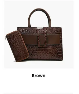 Detail view of brown crocodile embossed tote bag and matching long wallet set in brown