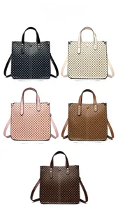 Detailed display of tote bags in black, beige, pink, yellow, and brown with grid patterns