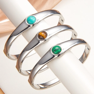 Ensemble de joncs vintage en acier avec pierres colorées turquoise, œil de tigre et malachite