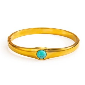 Bracelet jonc minimaliste en acier titane doré avec une pierre turquoise ronde sertie