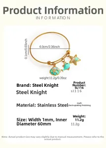 Macro shot of gold-plated stainless steel bangle with shell and starfish charms