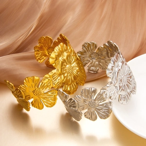 Vintage embossed floral titanium steel cuffs in gold and silver matte finishes