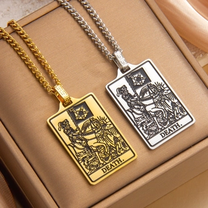 Gold and silver Tarot Death pendant necklaces on Cuban chains with polished finish