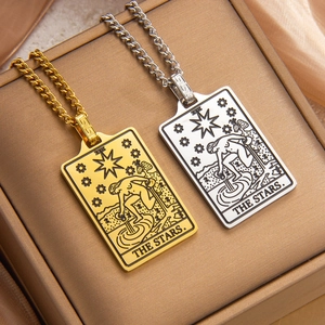 Tarot The Stars pendant necklace in gold and silver on silk for a luxury aesthetic