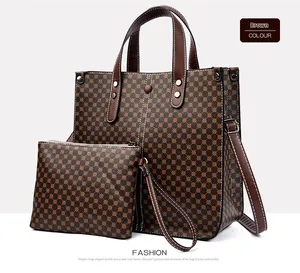 Brown geometric print tote bag set with matching inner pouch and luxury leather handles