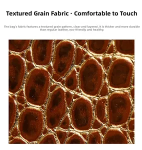 Macro detail of caramel brown crocodile embossed faux leather with textured grain