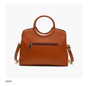 Rear view of caramel brown tote bag with zipper pocket and round handle detail
